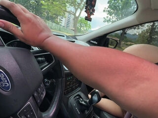 Cute teen gives her taxi driver a nice blowjob on the road POV