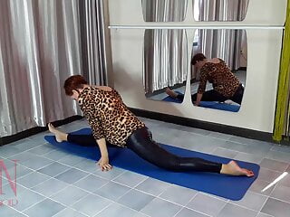Regina Noir. Yoga in beautiful leotards and spandex stretch pants is doing yoga in the gym. 1