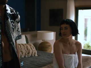 Dashing brunette spit-roasted by a pair of oversized black shafts