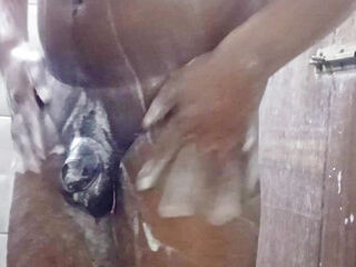 a desi boy bathing what he doing