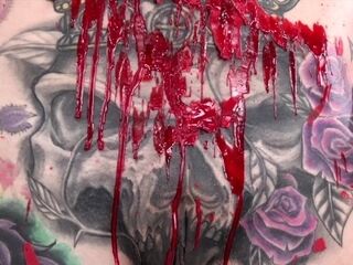 Inked honey Marie Bossette covers herself in molten paraffin paraffin wax