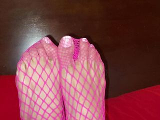 Truly sumptuous gams with lil soles with lengthy toes in rosy fishnet pantyhose