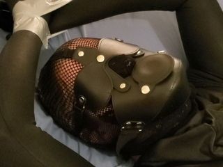 Ballgagged in overall catsuit. Spunk with plastic fetish mask