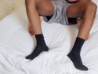 Thick ebony lays with her back bend and takes backshots