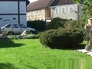 Sunbathing grandmother blows stud in yard
